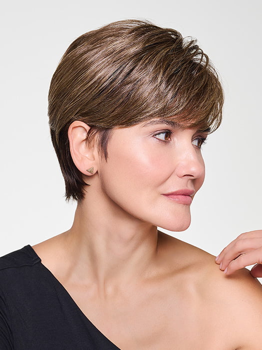 Model is wearing CROP CUT TOPPER by HAIRDO in color SS9/24 ICED CAFÉ LATTE | Dark Brown shaded with Golden Brown