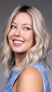 Model is wearing KARLIE by BELLETRESS in color BUTTERBEER R | Dark Brown Base and Root that transitions smoothly into a buttery blonde, infused with creamy honey and toffee tones