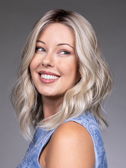 Model is wearing KARLIE by BELLETRESS in color BUTTERBEER R | Dark Brown Base and Root that transitions smoothly into a buttery blonde, infused with creamy honey and toffee tones