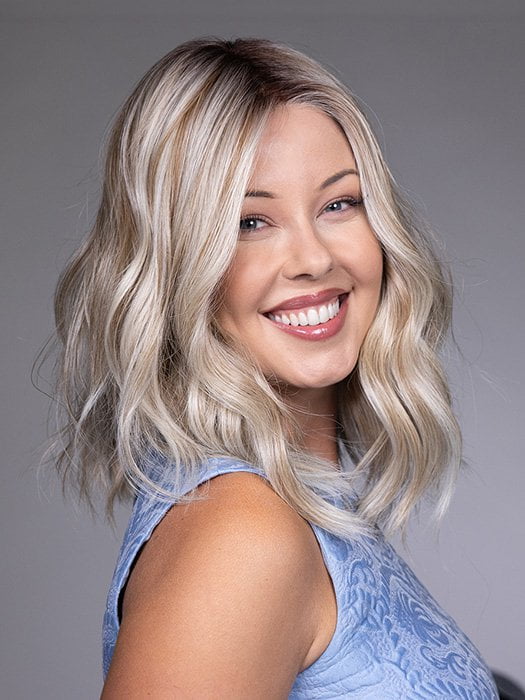 Model is wearing KARLIE by BELLETRESS in color BUTTERBEER R | Dark Brown Base and Root that transitions smoothly into a buttery blonde, infused with creamy honey and toffee tones