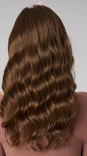 Model is wearing MAYA HAND TIED by ENVY in color MACCHIATO | A blend of Chestnut Brown and Soft Dark Blonde with Dark Brown Roots