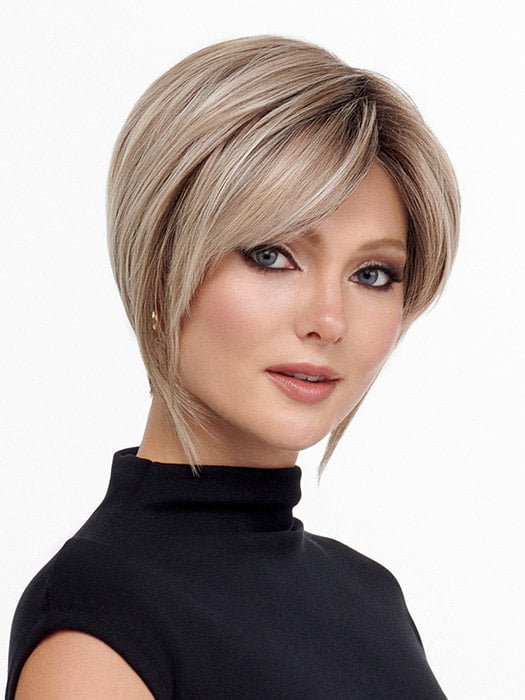 Model is wearing THE ROUGE by TRESSALLURE in color 36/25/23/R6 MOON DUST | Dark salt and pepper base with blended golden blonde and cool platinum tones, shaded with Dark Roots