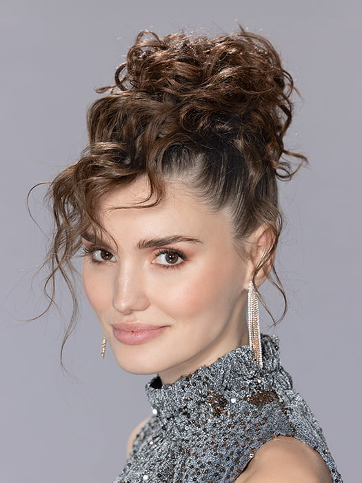 Model is wearing ICE by ELLEN WILLE in color CHOCOLATE-MIX | Medium Brown Blended with Light Auburn, and Dark Brown Blend