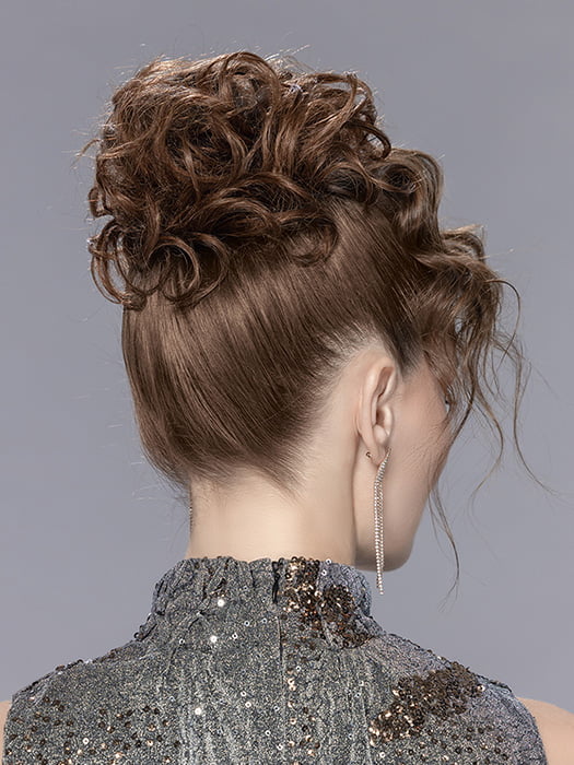 Model is wearing ICE by ELLEN WILLE in color CHOCOLATE-MIX | Medium Brown Blended with Light Auburn, and Dark Brown Blend