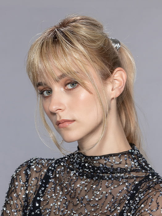Model is wearing LEMON II by ELLEN WILLE in color SANDY BLONDE ROOTED 16.22.14 | Medium Blonde and Light Neutral Blonde with Medium Ash Blonde Blend and Shaded Roots