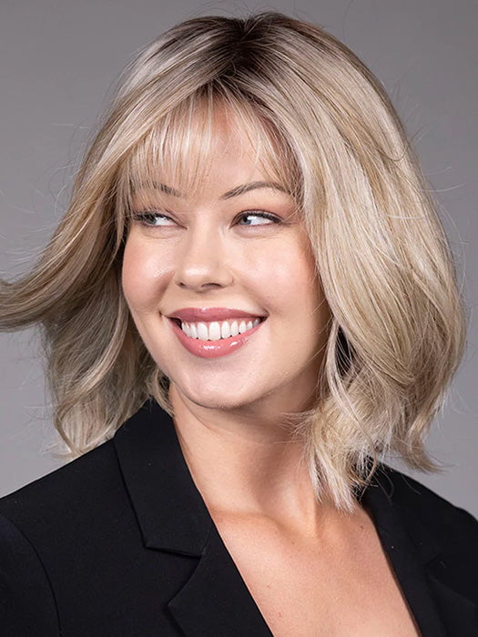 Model is wearing CATALINA in BUTTERBEER R | Dark Brown Base and Root that transitions smoothly into a buttery blonde, infused with creamy honey and toffee tones