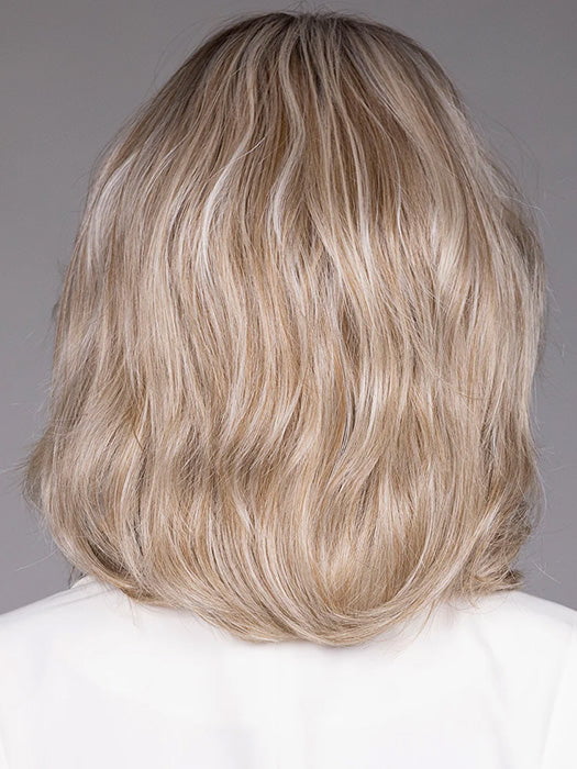 Model is wearing WINSTON in BUTTERBEER R |  A rich blend of warm brunette and golden honey highlights finished with a soft, natural root.