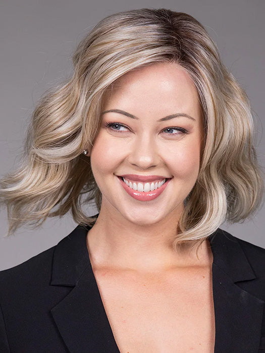 Model is wearing VERONICA in Butter Beer R | Dark Brown Base and Root that transitions smoothly into a buttery blonde, infused with creamy honey and toffee tones