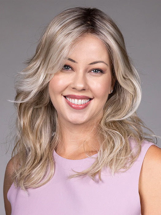 Model is wearing MARIE in BUTTERBEER R | Dark Brown Base and Root that transitions smoothly into a buttery blonde, infused with creamy honey and toffee tones