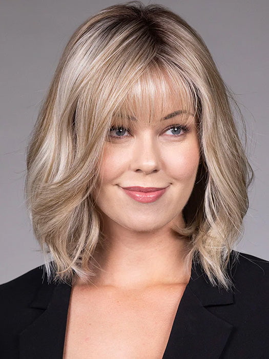Model is wearing CATALINA in BUTTERBEER R | Dark Brown Base and Root that transitions smoothly into a buttery blonde, infused with creamy honey and toffee tones