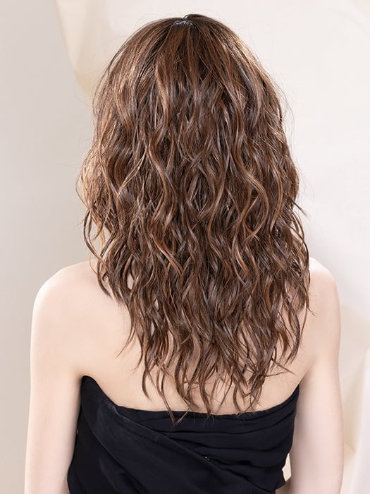 Model is wearing SERENA in CHESTNUT SHADED 830.31.6 | Medium Brown Blended with Light Auburn and Light Reddish Auburn with Dark Brown Blend with Shaded Roots