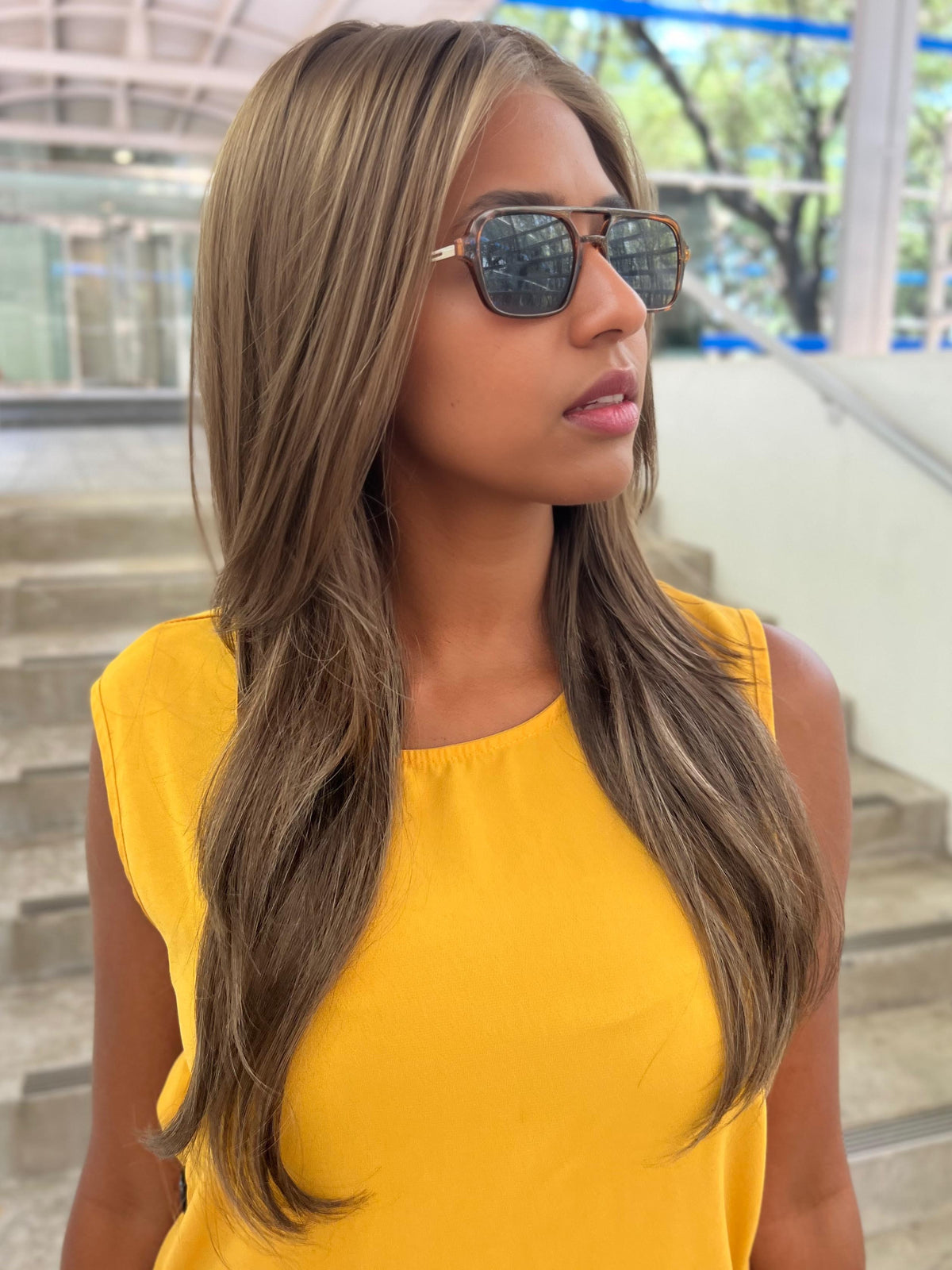 Sophia wearing ZARA LITE by Jon Renau in 8RH14 MOUSSE CAKE | Medium Brown with 33% Medium Natural Blonde Highlights