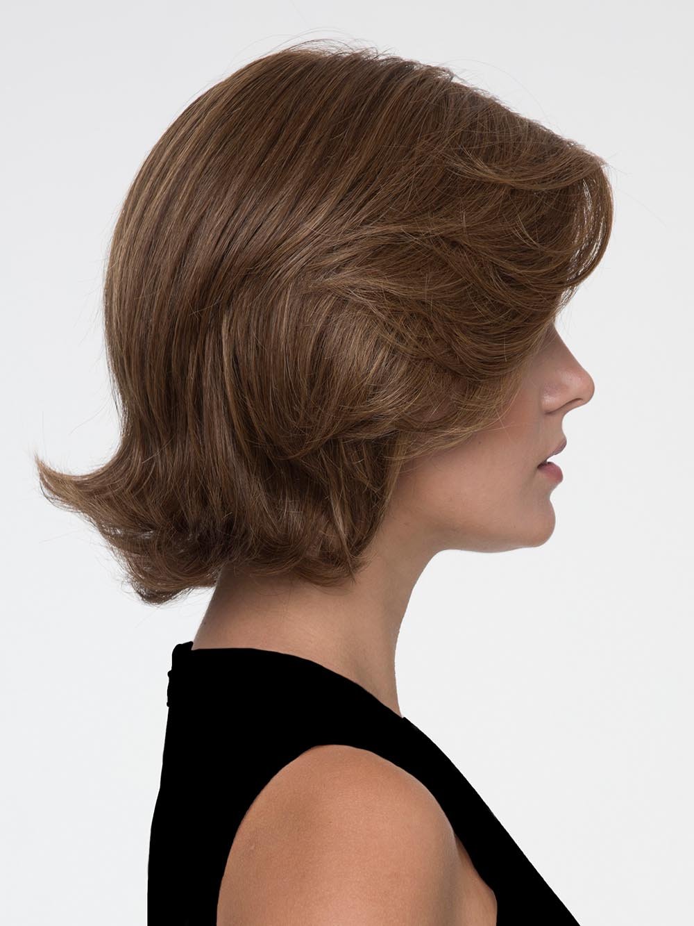 Face-framing layers and flipped out ends add a touch of whimsy to any wardrobe