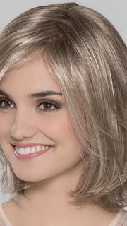 Super lightweight and ready to wear wig. She has long layers throughout and hit's perfect at the shoulders