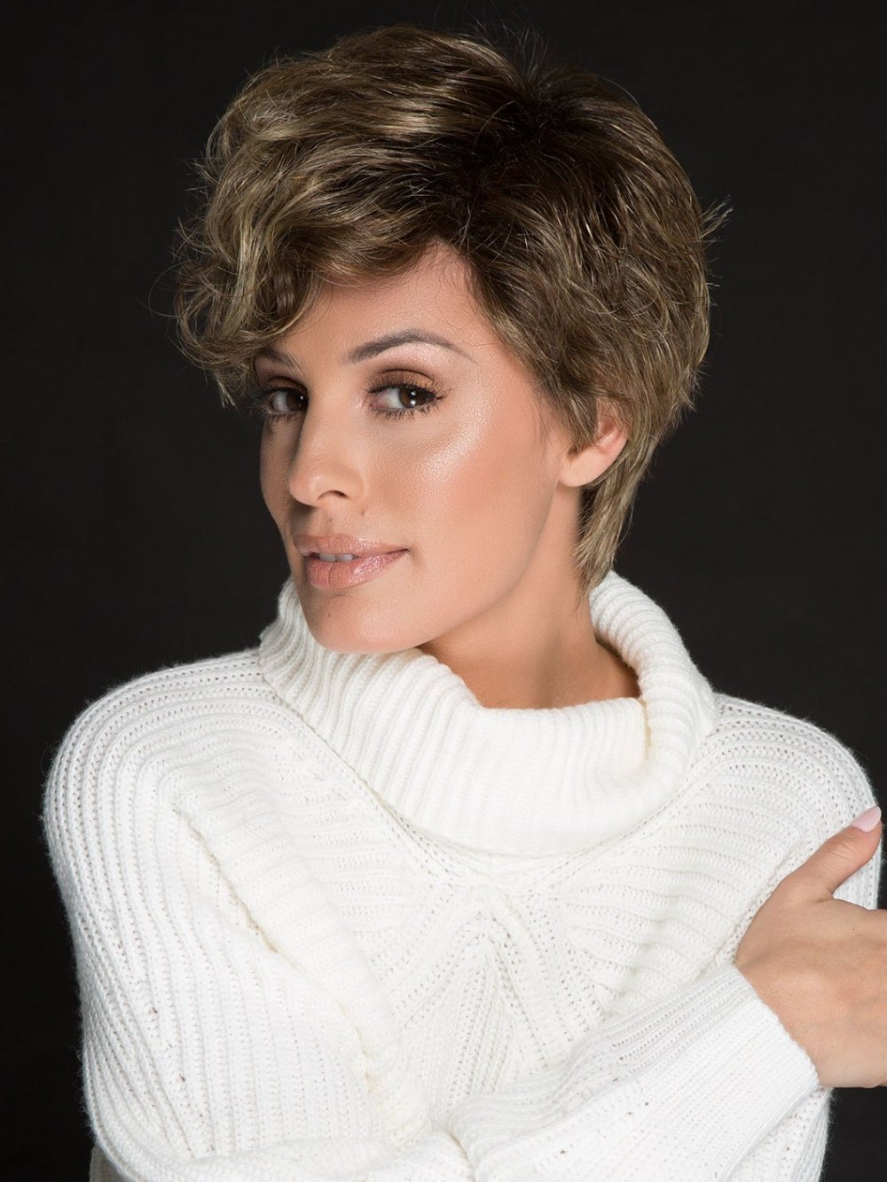 There is a small monofilament placed on the crown area to offer volume and the appearance of the hair coming from the scalp
