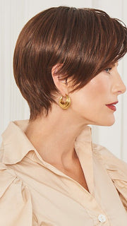 Fluff up with a comb or simply shake out and wear