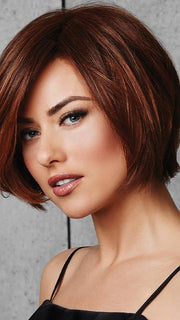 Long, side sweeping fringe and subtly layered, chin-length sides frame the face