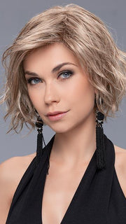 It's very fine and simulates natural hair while being soft to the touch and moving freely. With this fun style, you will be ready night or day
