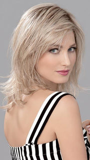 With all-over layers keep this shag like style fun and fresh looking for any event