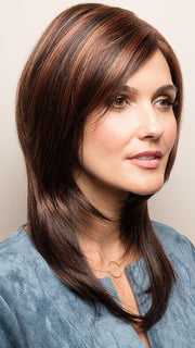 Dramatic side-swept fringe for a versatile retro look