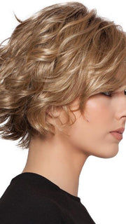 A short-layered style with soft curls and a long off-center bang